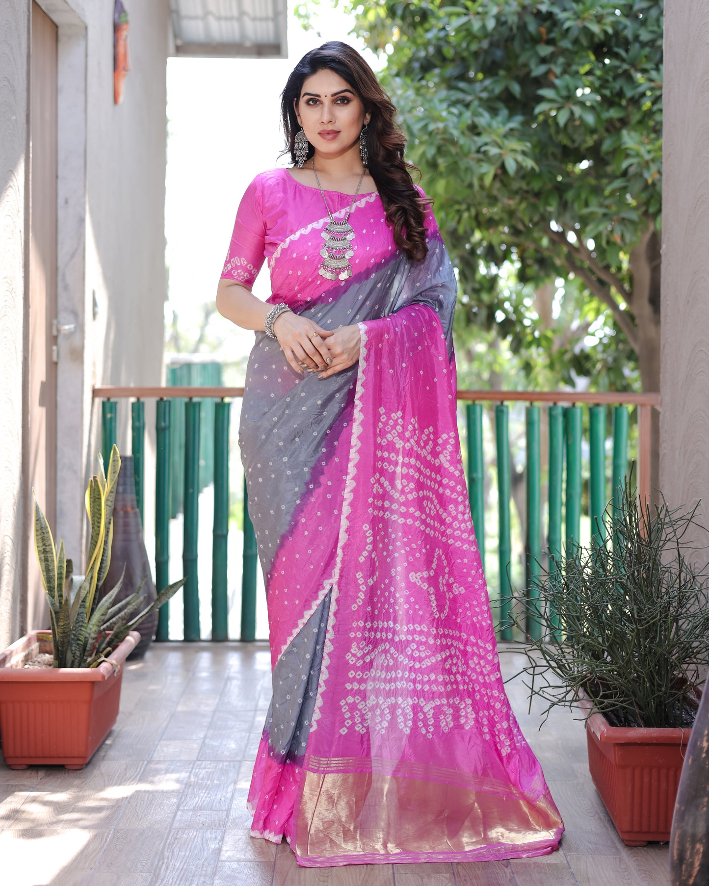 New Premium And High Quality Comfortable Bandhej Silk Drapes That is Super Stylish And Pretty Grey And Pink Saree