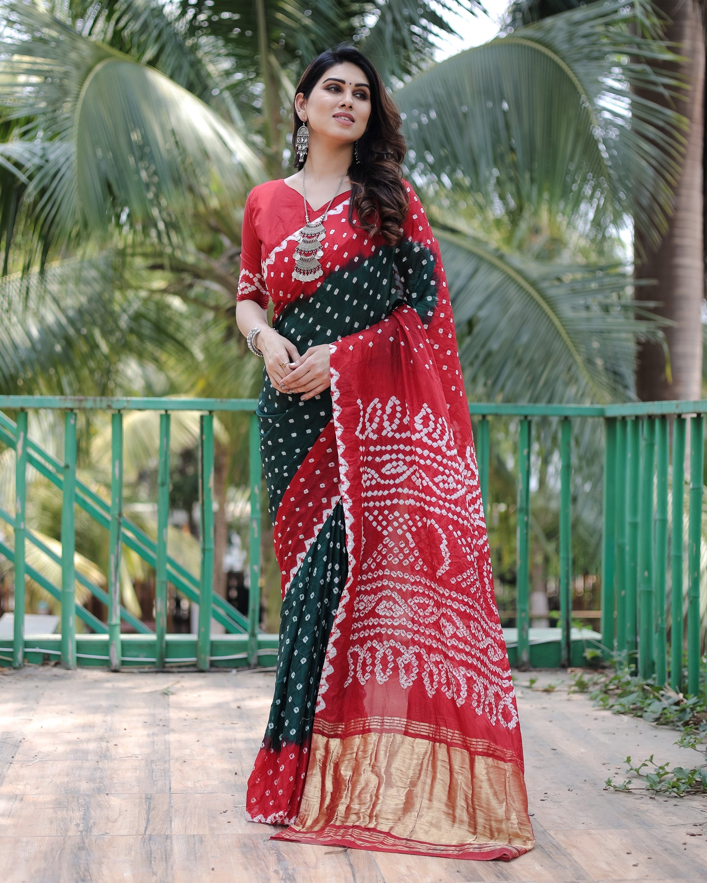 New Premium And High Quality Comfortable Bandhej Silk Drapes That is Super Stylish And Pretty Green And Red Saree