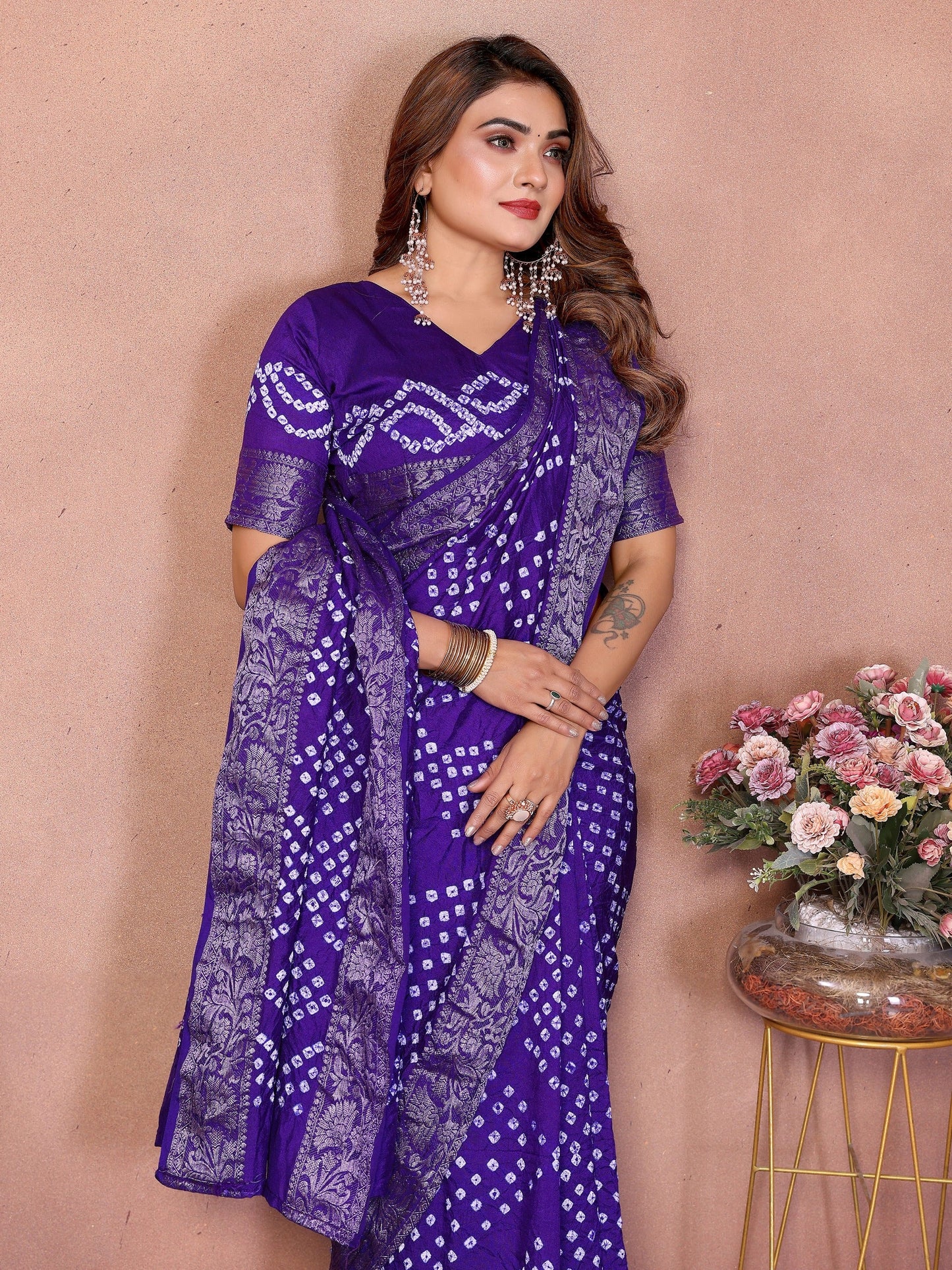 Experience Timeless Elegance With Our Green Pure Handmade Bandhej Dola Silk Saree