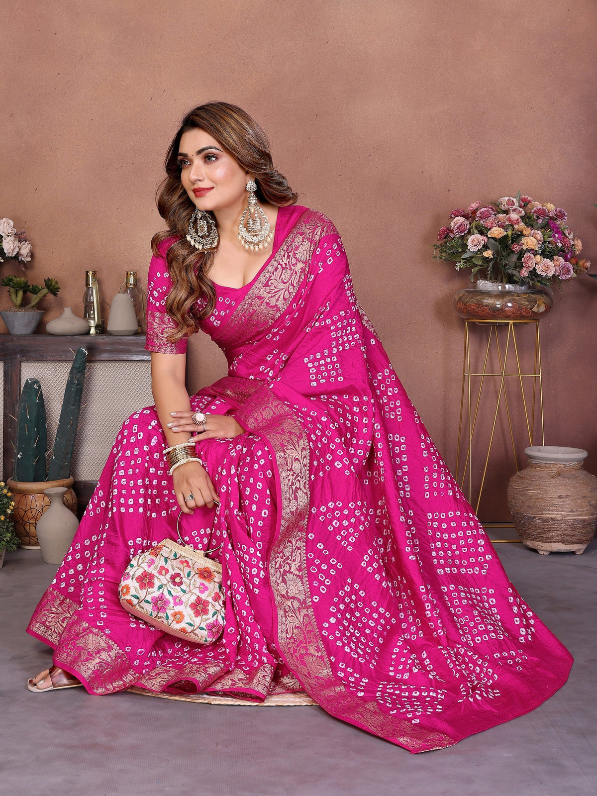 Experience Timeless Elegance With Our Pink Pure Handmade Bandhej Dola Silk Saree